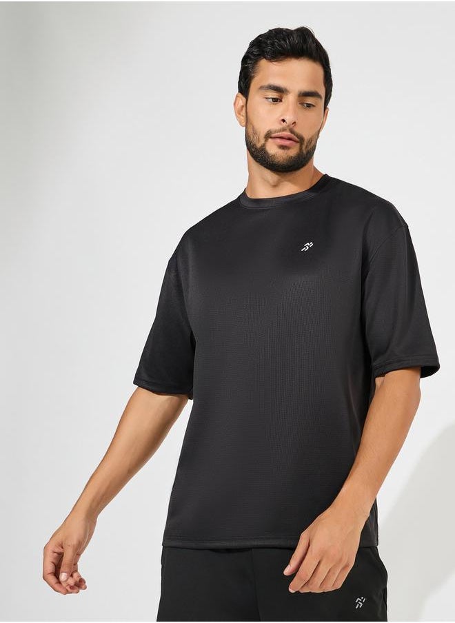Styli Soft Texture Badge Detail Oversized Athleisure T-Shirt  - Image 1