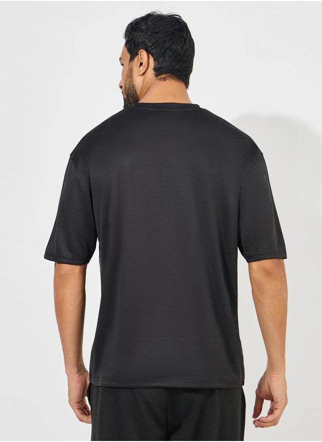 Styli Soft Texture Badge Detail Oversized Athleisure T-Shirt  - Image 4
