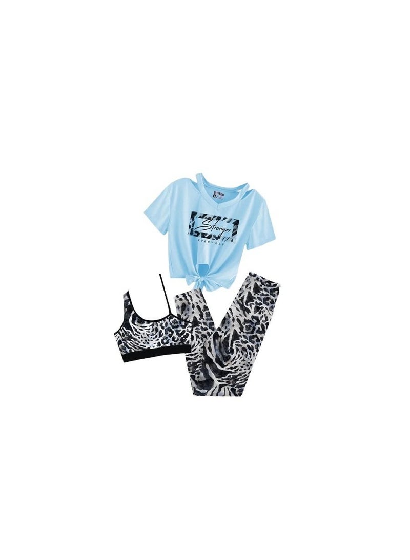 Women's sport set consisting of a blue T-shirt and black and white pants 