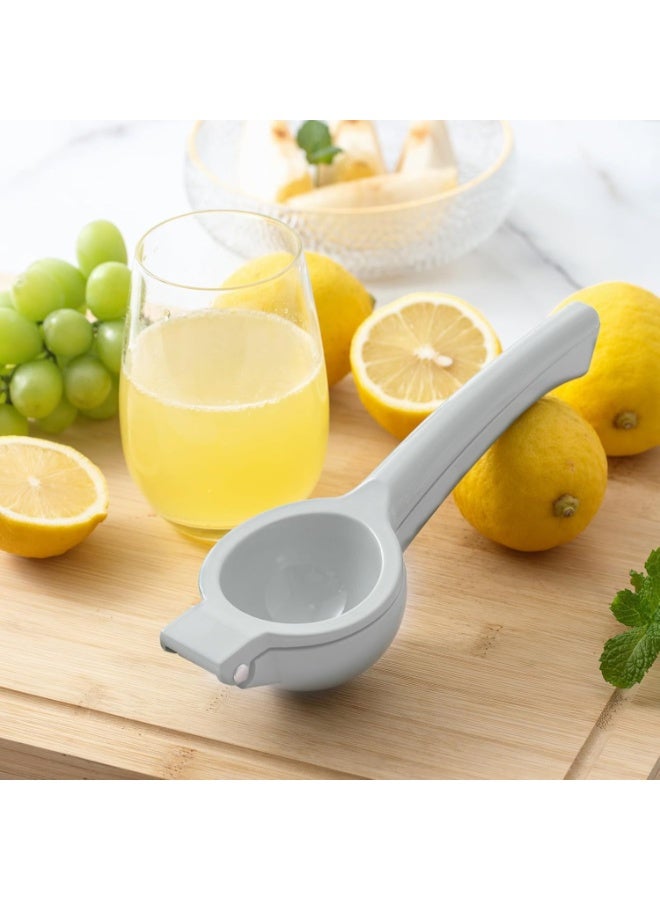 A manual lemon squeezer made from durable break-resistant plastic, perfect for quick and easy citrus juicing in the kitchen. - Image 1