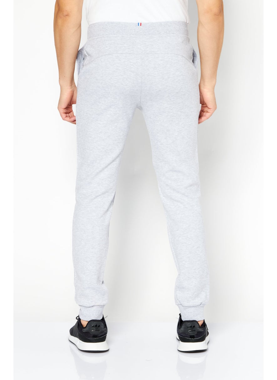 le coq sportif - Men Sportswear Fit Brand Logo Outdoor Sweatpants, Grey - Image 1