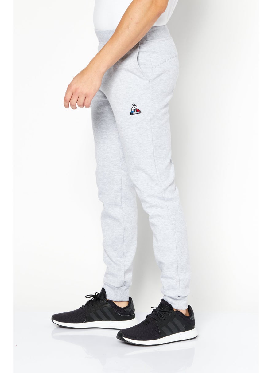 le coq sportif - Men Sportswear Fit Brand Logo Outdoor Sweatpants, Grey - Image 1