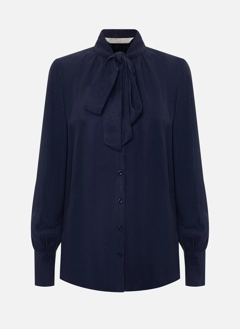 Lichi Loose blouse with ribbons on the collar