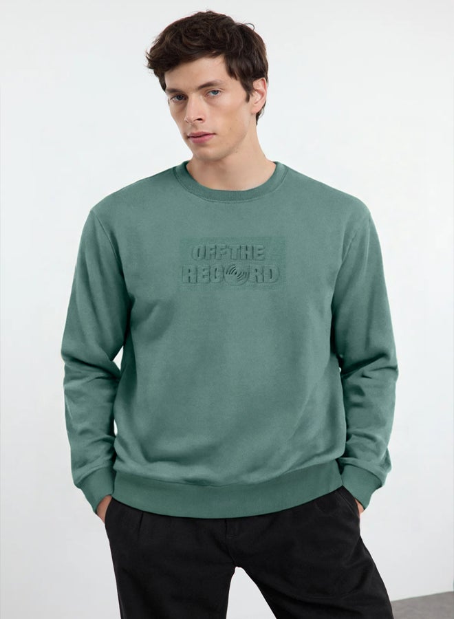 trendyol Green Oversize/Wide Cut Embossed Text Printed Unshaded Sweatshirt - Image 1