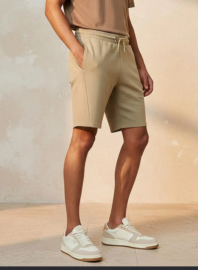 Splash Active Beige Men Performance Perforated Panel Shorts for Men | Best Price UAE
