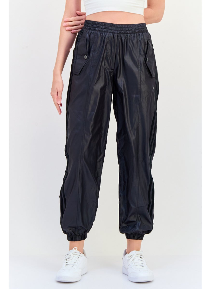 adidas Originals Women Loose Fit Outdoor jogger Pants, Black  - Image 1