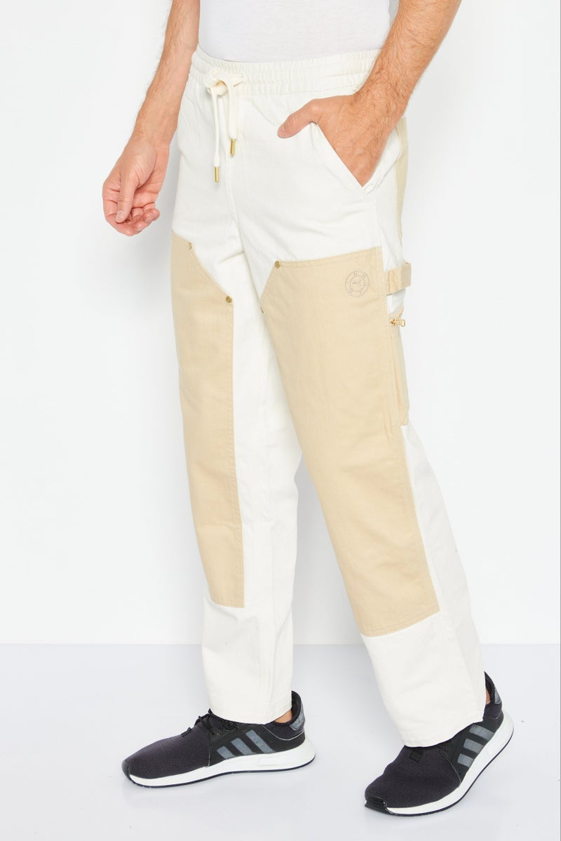 PUMA بنطلون رياضي خارجي للرجال من بومة x رويجي، متعدد الألوان - Image 4