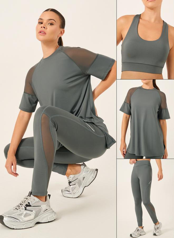 ستايلي اكتيف مجموعة ستايلي أكتيف المكونة من 3 قطع - بلوزة بكتف شبكي، حمالة صدر رياضية بفتحة مزدوجة خلفية، وسروال ضيق - Image 1