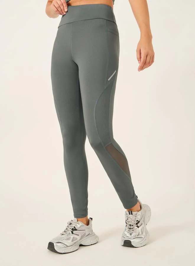 Styli Active  Pack of 3 - Shoulder Mesh Detail Top, Back Dual Tear Drop Sports Bra and Leggings for Women | Best Price UAE
