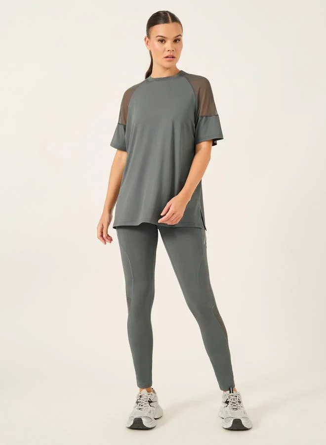 Styli Active  Pack of 3 - Shoulder Mesh Detail Top, Back Dual Tear Drop Sports Bra and Leggings for Women | Best Price UAE