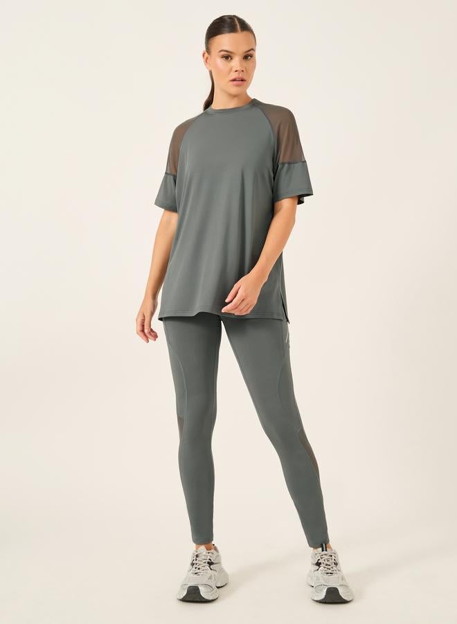 ستايلي اكتيف مجموعة ستايلي أكتيف المكونة من 3 قطع - بلوزة بكتف شبكي، حمالة صدر رياضية بفتحة مزدوجة خلفية، وسروال ضيق - Image 3