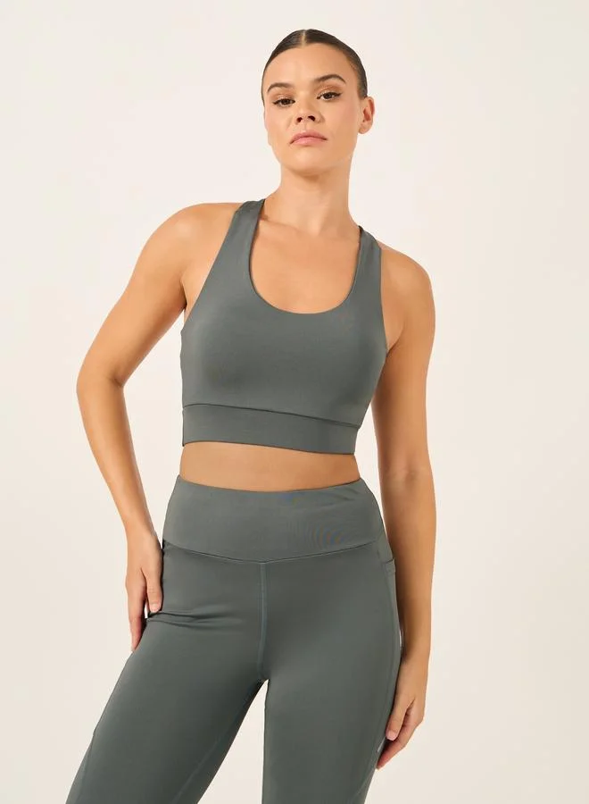 Styli Active  Pack of 3 - Shoulder Mesh Detail Top, Back Dual Tear Drop Sports Bra and Leggings for Women | Best Price UAE