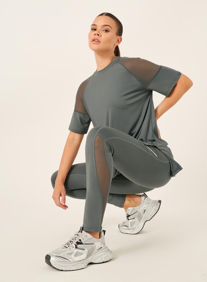 ستايلي اكتيف مجموعة ستايلي أكتيف المكونة من 3 قطع - بلوزة بكتف شبكي، حمالة صدر رياضية بفتحة مزدوجة خلفية، وسروال ضيق - Image 2