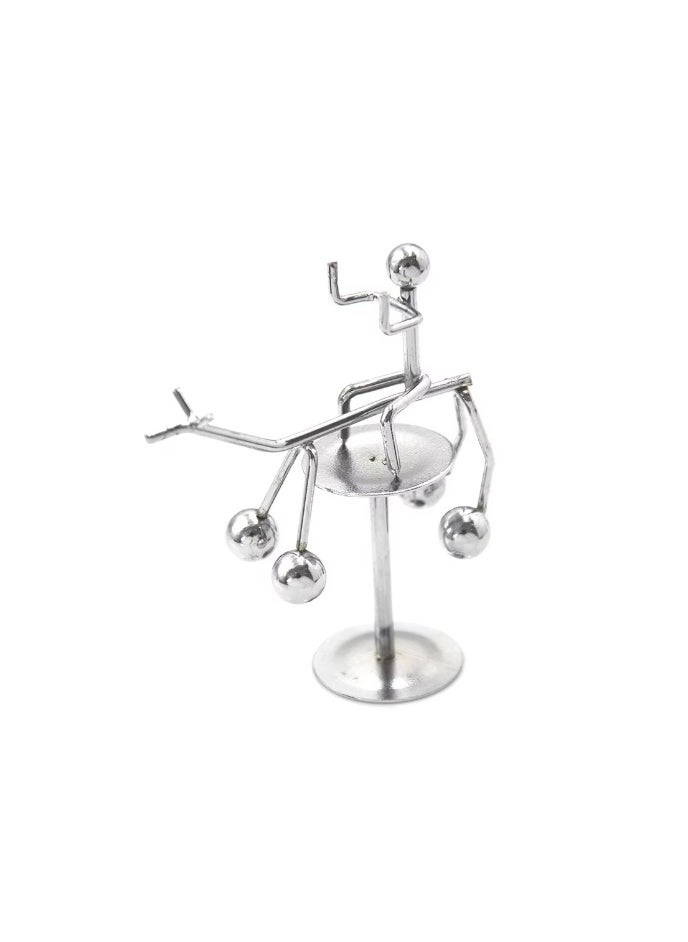 Generic - "Enjoy an experience of balance and calm with the Newton's Cradle - elegant design, smooth movement, and a clever decorative touch that adds a sophisticated scientific touch to your office or home. " - Image 1