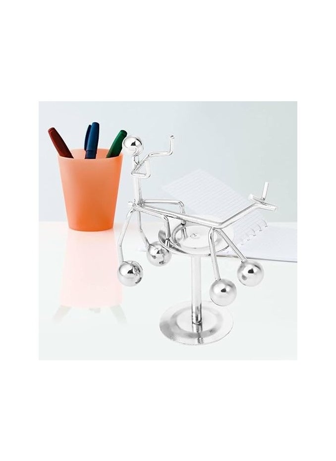 Generic - "Enjoy an experience of balance and calm with the Newton's Cradle - elegant design, smooth movement, and a clever decorative touch that adds a sophisticated scientific touch to your office or home. " - Image 1