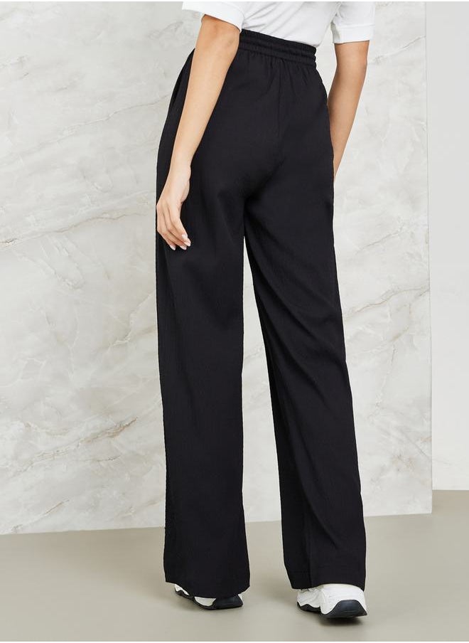 Styli - Textured Wide Leg Pants with Side Pocket - Image 1