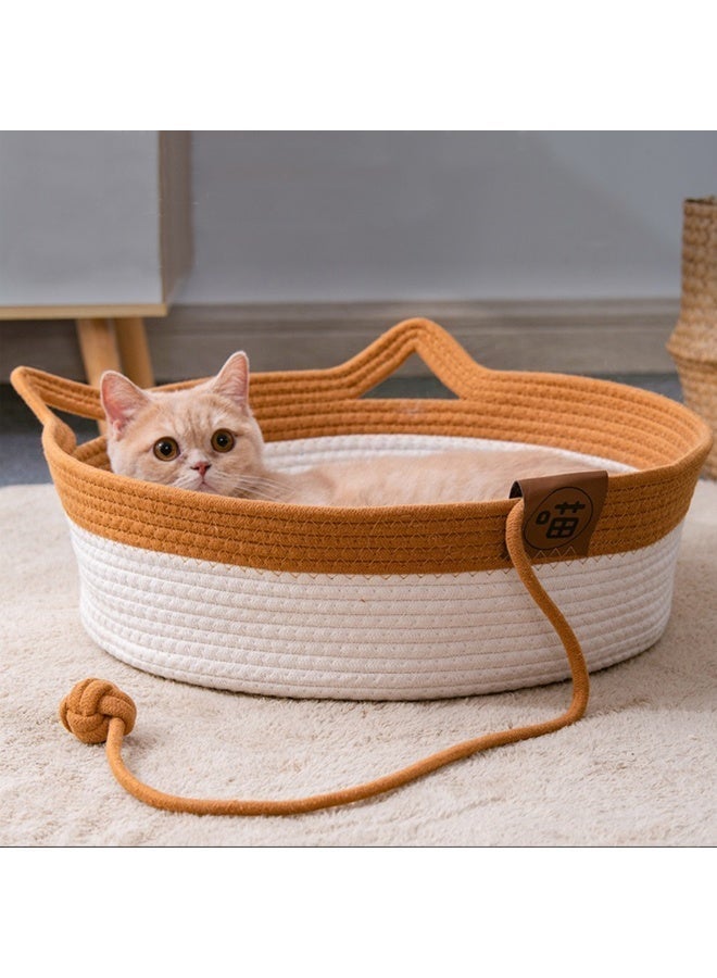 سرير قطط وكلاب صغيره فاخر على شكل سلة بأذنَي قط، مصنوع من حبال قطنية متينة، تصميم دافئ ومريح للاستخدام داخل المنزل، مزود بوسادة قطنية ناعمة قابلة للإزالة والغسل، حبل لعب مدمج للتسلية، قاعدة ثابتة وغير قابلة للانزلاق، مناسب للقطط الكبيرة والمتوسطة والكلاب الصغيرة، سرير نوم مريح وعملي للحيوانات الأليفة، قابل للحمل ويُحافظ على شكله، مثالي لغرف النوم وغرف المعيشة. - Image 1