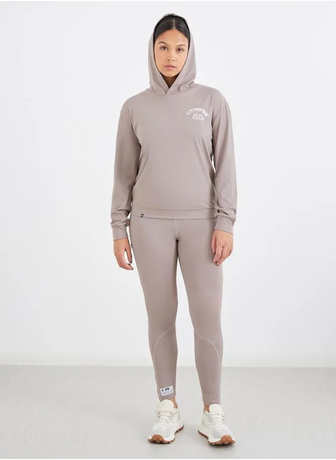 ستايلي Styli Gymspire Edition - Front and Back Text Detail Long Sleeve Hooded Top