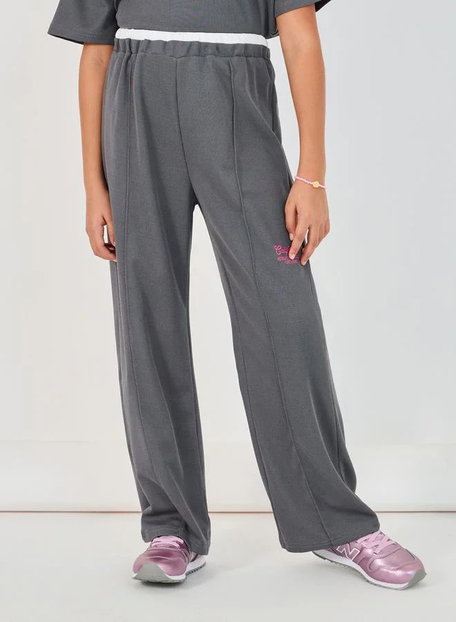 Styli Embroidered Short Sleeve Polo T-Shirt & Wide Leg Pintuck Joggers Co-Ords