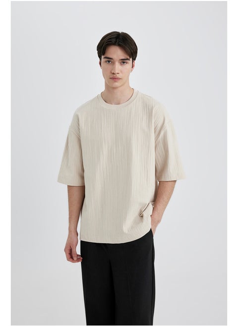 Man Loose Fit Crew Neck Short Sleeve Knitted T-Shirt