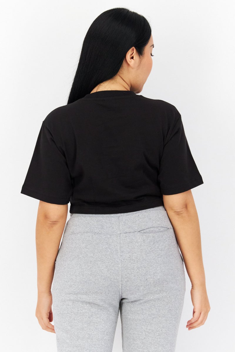 PUMA Women Relaxed Fit Short Sleeve Brand Logo Training Crop Top, Black  - Image 3