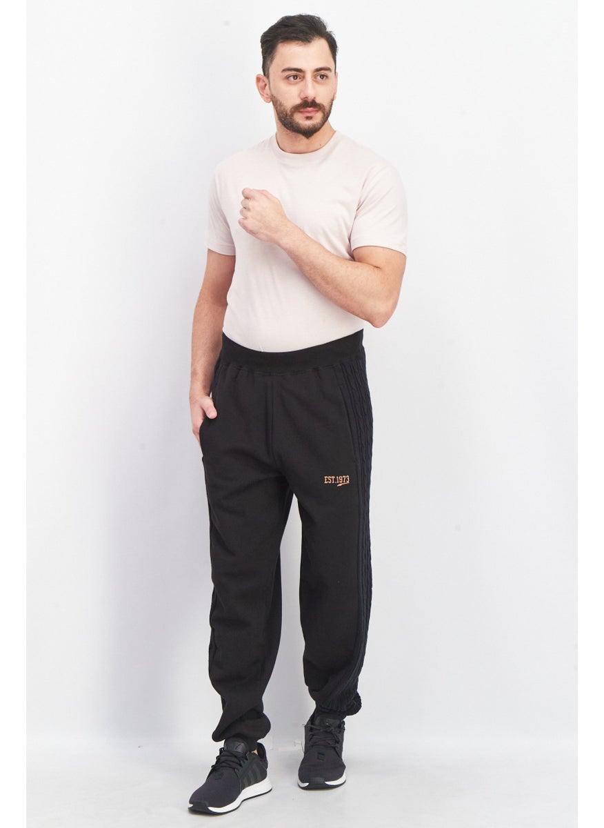 PUMA Men Sportswear Fit Textured Jogger Pants, Black  - Image 4