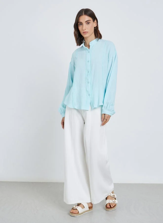 تايك تو بلوزة سادة فضفاضة بتفاصيل أزرار