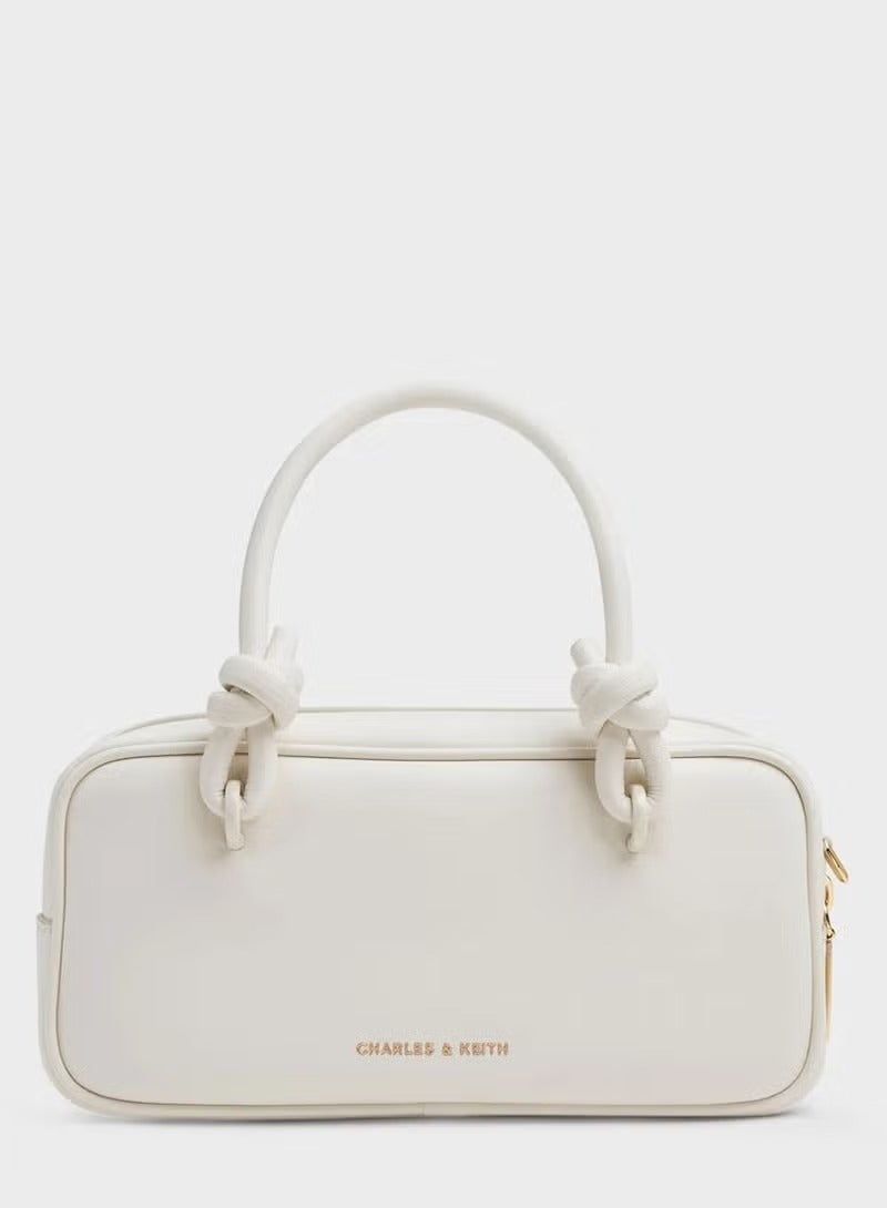 Charles & Keith Sammie Knotted-Handle Elongated Bag - Image 1
