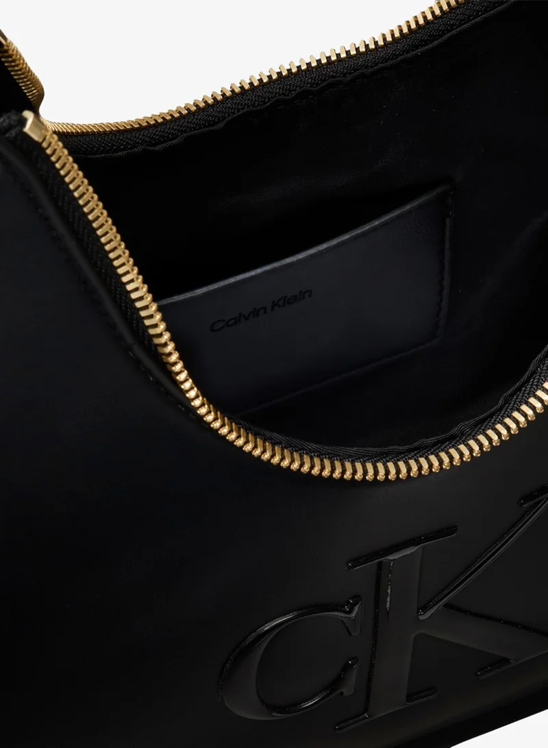 Calvin Klein  Embossed Monogram Crescent Bag for Women | Best Price UAE