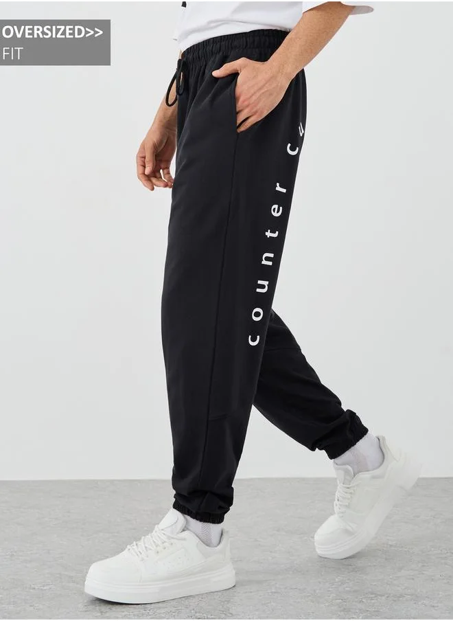 ستايلي Styli Slogan Print Oversized Joggers with Drawstring