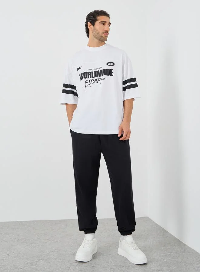 Styli Styli Slogan Print Oversized Joggers with Drawstring