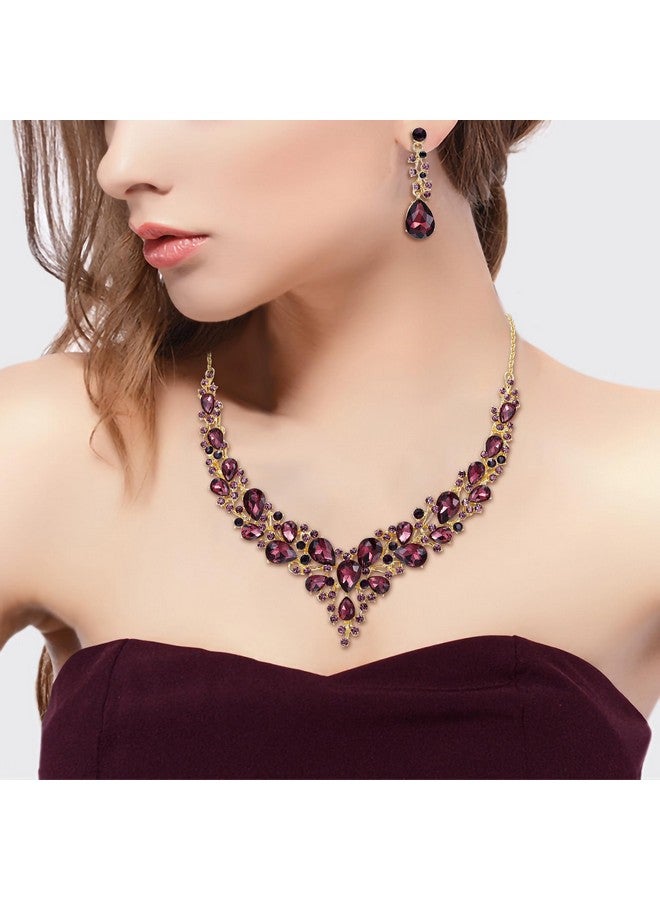 بريلوف طقم مجوهرات للنساء من عقد وأقراط على شكل دمعة من الكريستال النمساوي، طقم أقراط متدلية على شكل دمعة من اللون الجمشتي الداكن مع لمسة ذهبية - Image 3