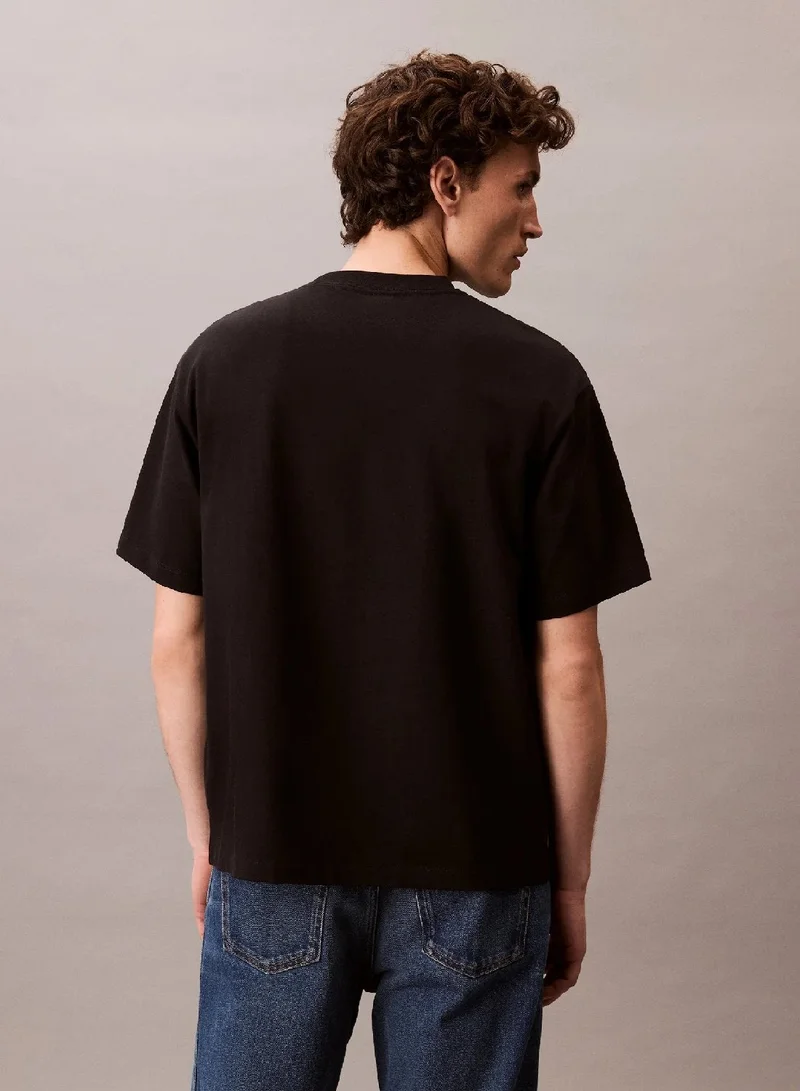 Calvin Klein Jeans  Script Logo Graphic Relaxed T-Shirt for Men | Best Price UAE