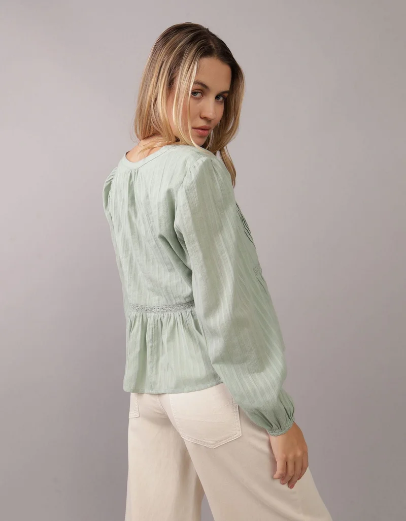 امريكان ايجل بلوزة بيبي دول بأكمام طويلة