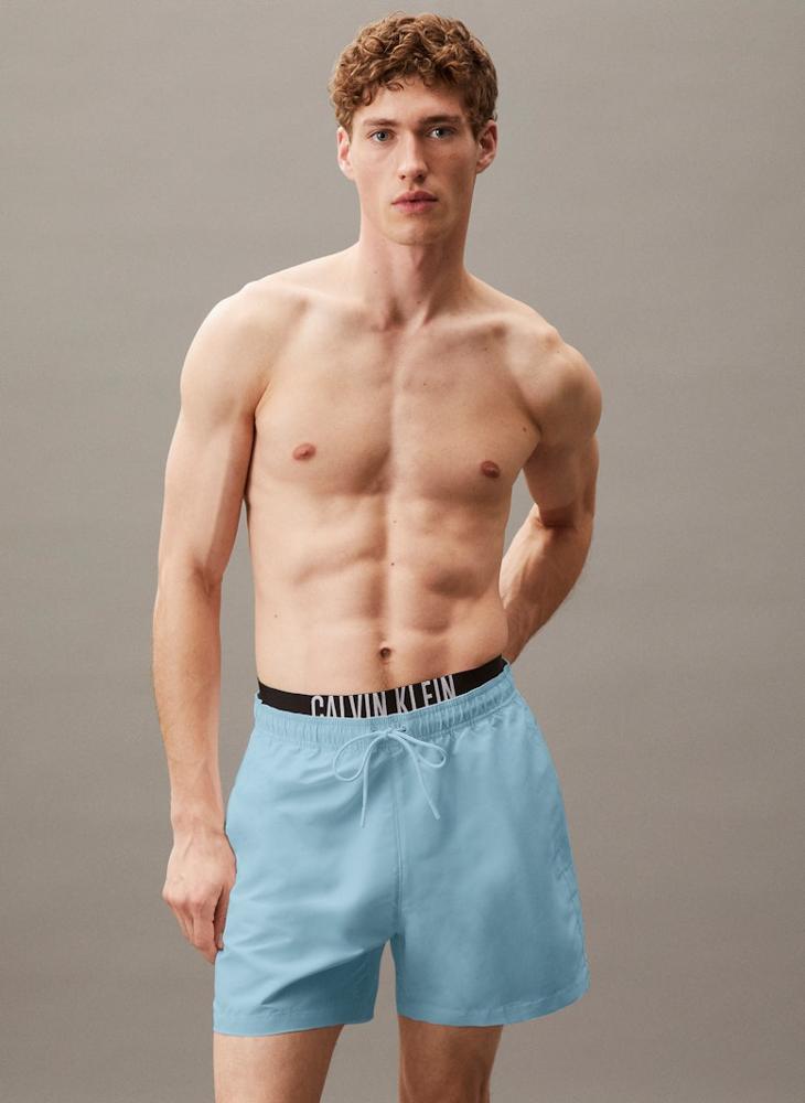 كالفن كلاين شورت سباحة بخصر متوسط - Image 1