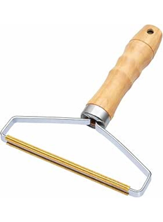 Lint and metal duster with a wooden handle – a practical tool for easily cleaning clothes and upholstery anywhere. - Image 1