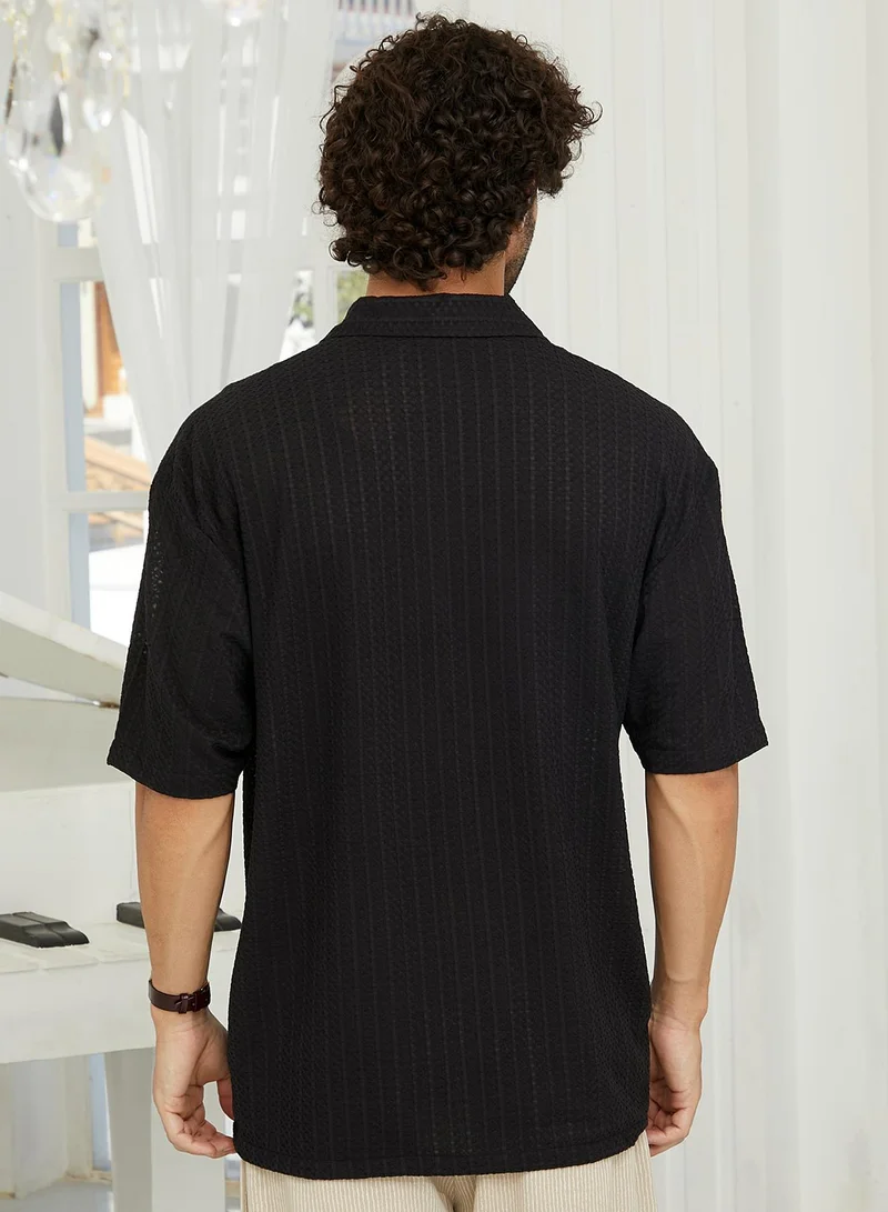 Campus Sutra Campus Sutra Men's Midnight Black Zigzag-Helix Resort Oversized Shirt For Casual Wear | Cuban Collar | Short Sleeves | Button Closure | Oversize Shirt Crafted With Comfort Fit For Everyday Wear