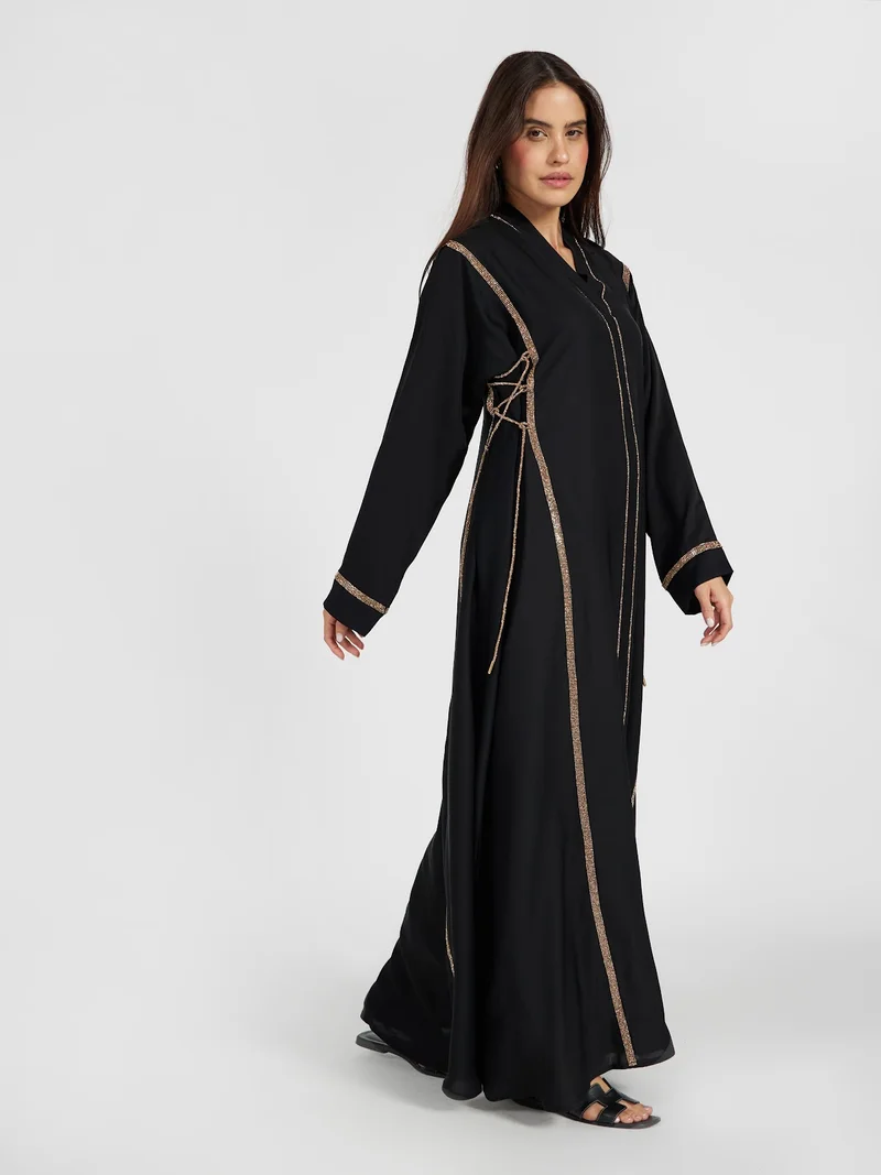 Reem Abayas Minimalist Black Abaya with Gold Sequin Panel Lines