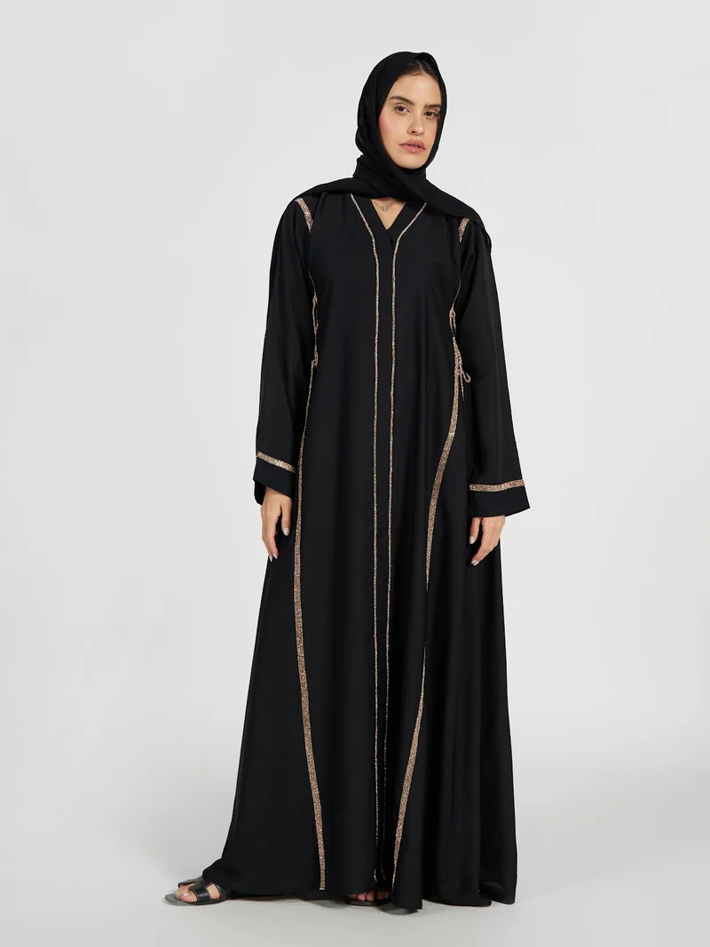 Reem Abayas Minimalist Black Abaya with Gold Sequin Panel Lines