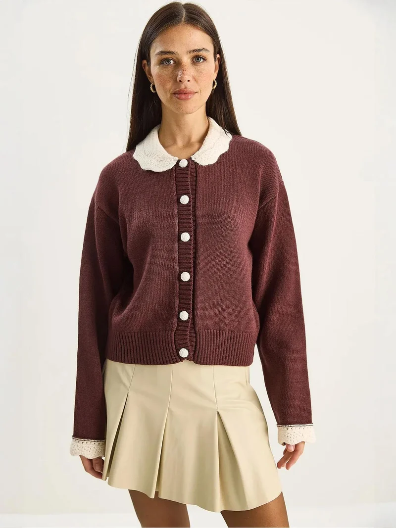 بيانكو لوتشي كارديجان محبوك مضلع سميك بأزرار