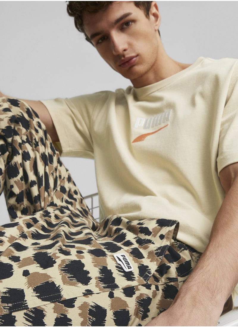 PUMA - DOWNTOWN Mens Printed Woven Sweatpants - Image 1