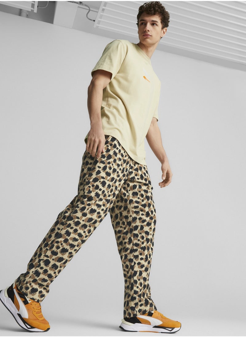 PUMA - DOWNTOWN Mens Printed Woven Sweatpants - Image 1