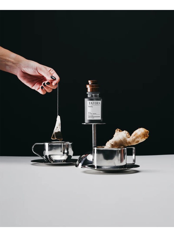 TATERA GRAVITY - A fragrance that awakens the imagination, blending the rich warmth of amber with the depth of green tea and citrus. - Image 2
