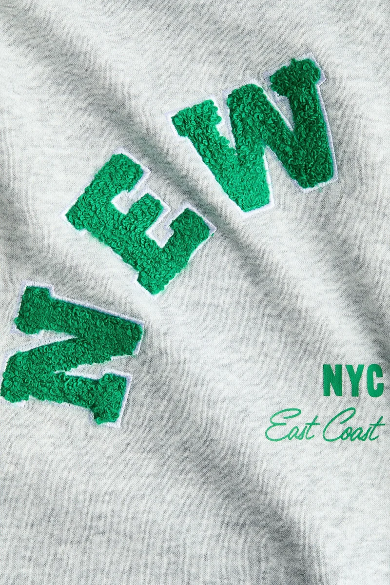 اتش اند ام هودي بسحّاب بتفاصيل مزيّنة