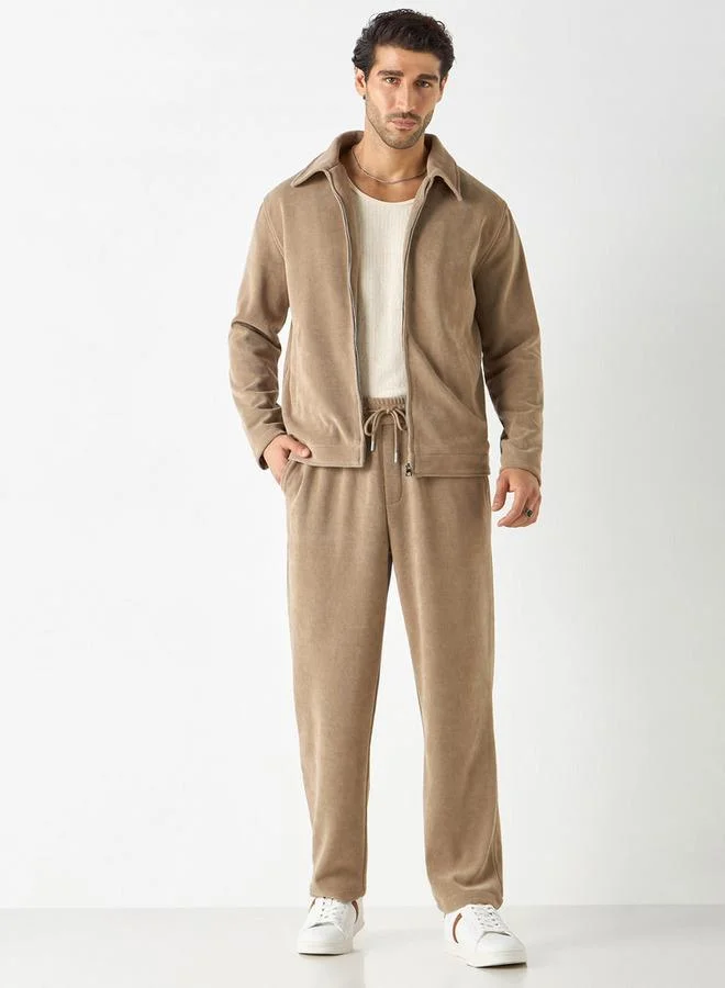 ايكونيك بنطلون رياضي بارز الملمس بقصّة مريحة مع جيوب من آيكونيك