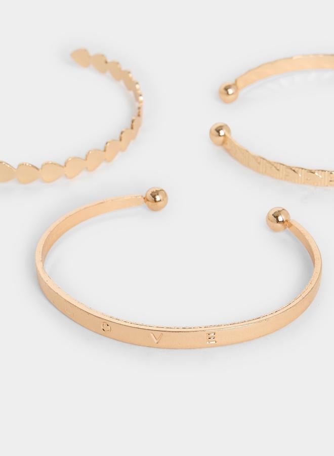 ستايلي طقم مكون من 7 أساور بانغل ذهبية - Image 3
