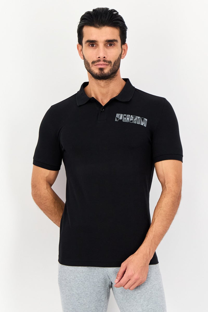 PUMA Men Sportswear Fit Short Sleeve Outdoor T Shirt, Black - Image 1