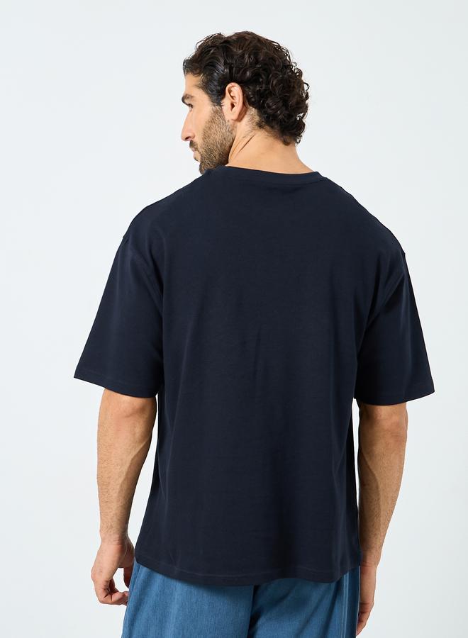 ستايلي تيشيرت فضفاض بتفاصيل جيوب - Image 5