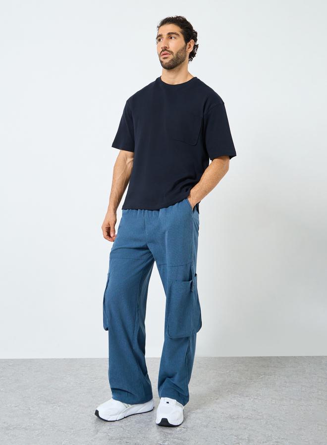 ستايلي تيشيرت فضفاض بتفاصيل جيوب - Image 3