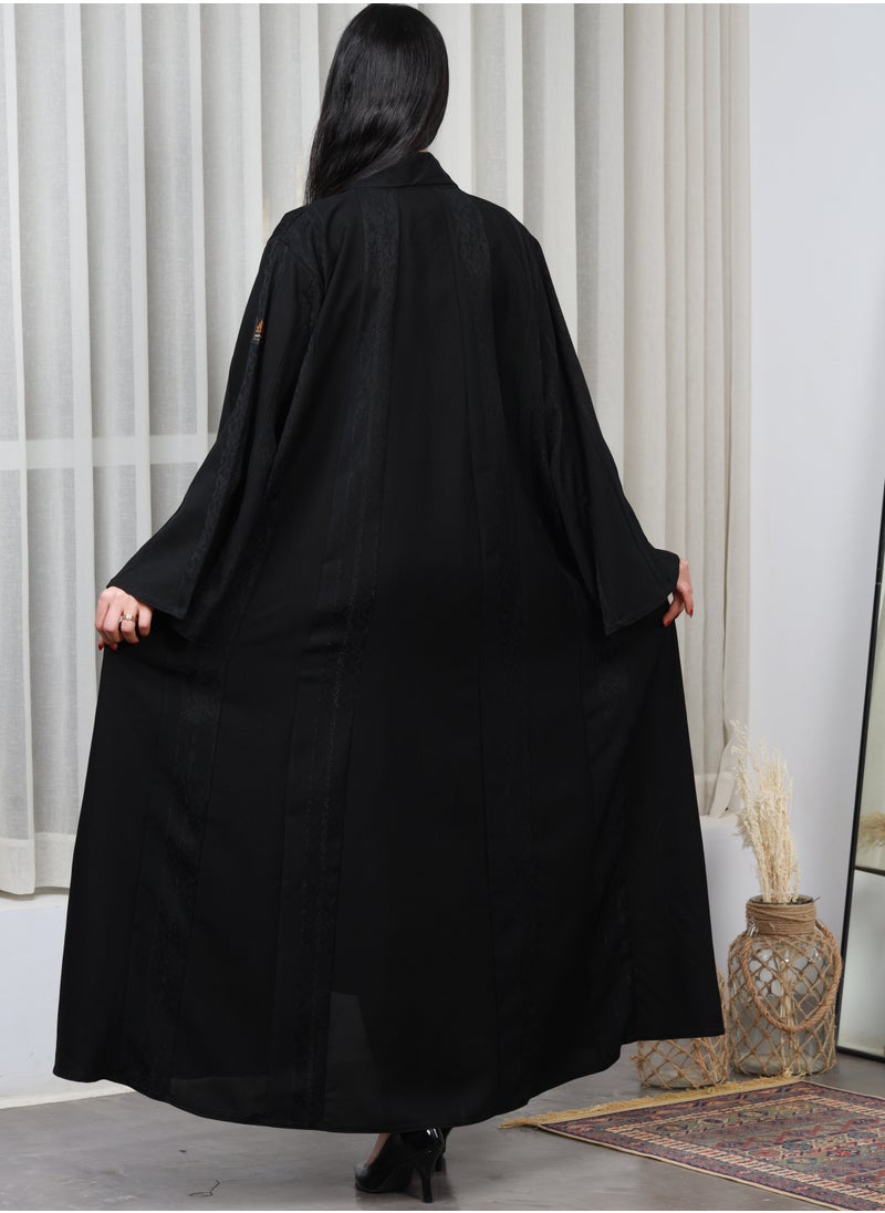 alwan aljamal - Black abaya made of linen fabric, distinguished by a longitudinal floral pattern - Image 1
